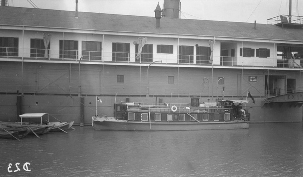 Taikoo Sugar Refinery motor house boat beside a hulk, Hong Kong