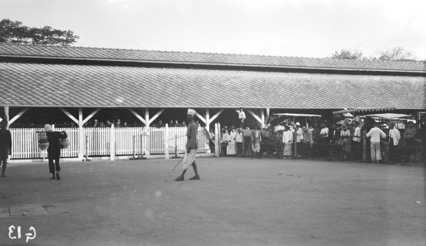 Workers and Sikh guard at Borneo Wharf, Bangkok, Thailand