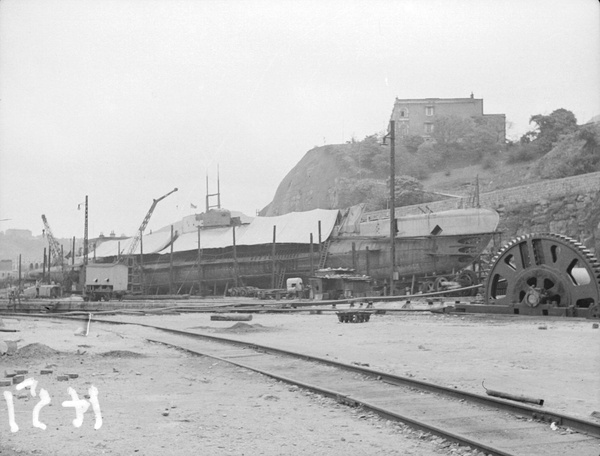 A submarine being repaired on a dry dock slipway, Hong Kong