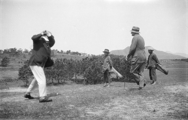 George Macdonald Young playing golf at Fanling, Hong Kong