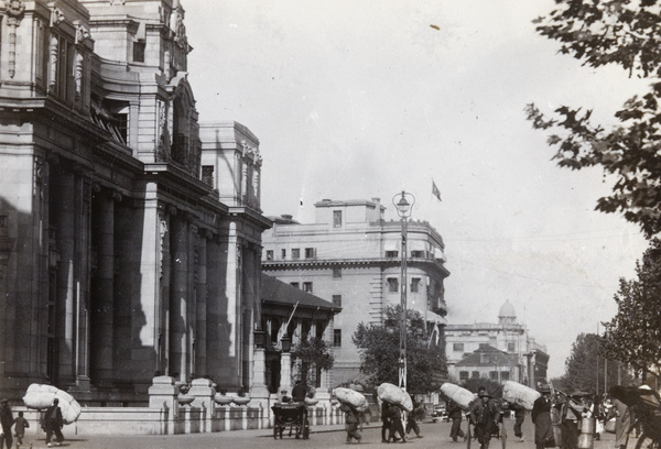 Porters outside the Hongkong and Shanghai Bank building, the Bund, Hankow