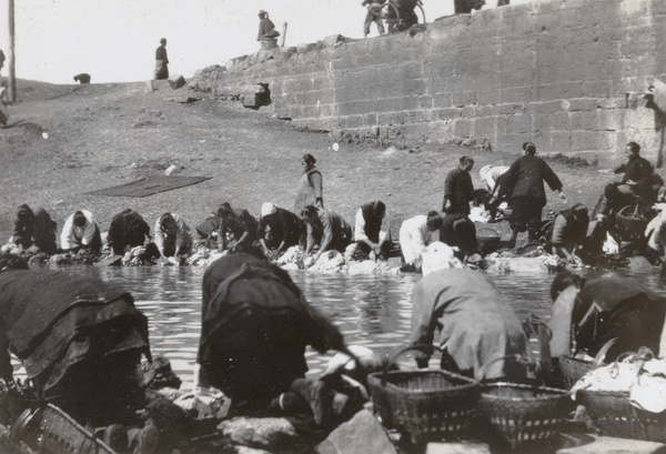 Women washing laundry in a river, Nanking