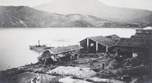 The steam launch 'Stibnite' at the pier, China Mining & Metal Company Ltd works during construction, Gin Drinkers Bay (醉酒灣), Hong Kong