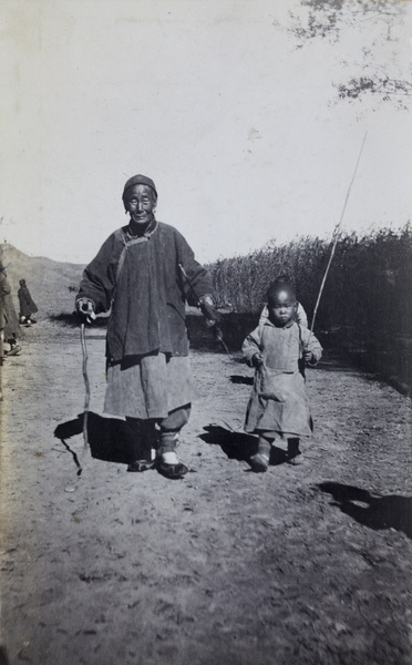 People beside a field