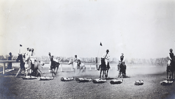 Horsemanship display with dummies, at Peking racecourse (Pao Ma Chang)