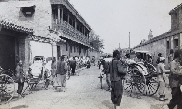 Jinyu Hutong (Goldfish Lane), with many parked rickshaws, Peking