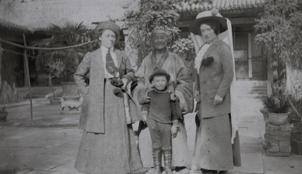 A group in a courtyard, Peking