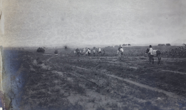 A party touring on donkeys near Peking