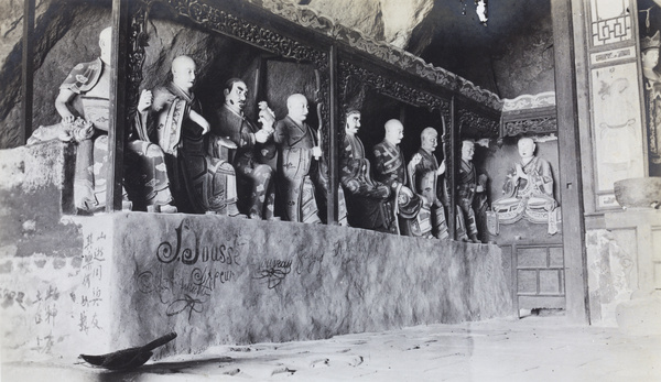 Buddhist shrine in Hsuanyang Cave, near Qinhuangdao (Shanhaikuan), with graffiti