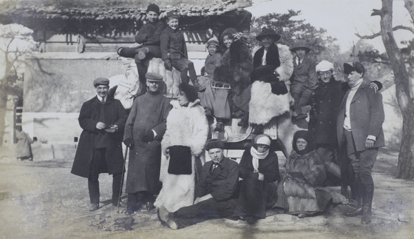 Group on/around horse sculpture, Tomb of the Princess, Peking