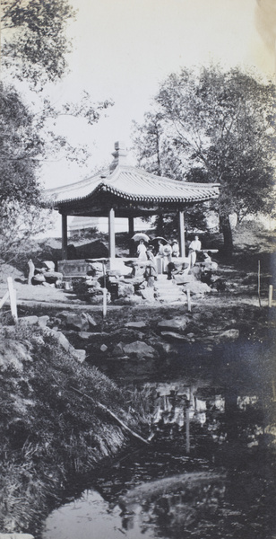 A pavilion by a pond