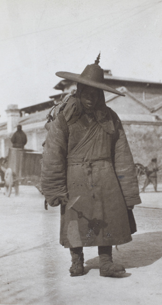 A man with a distinctive pointed hat