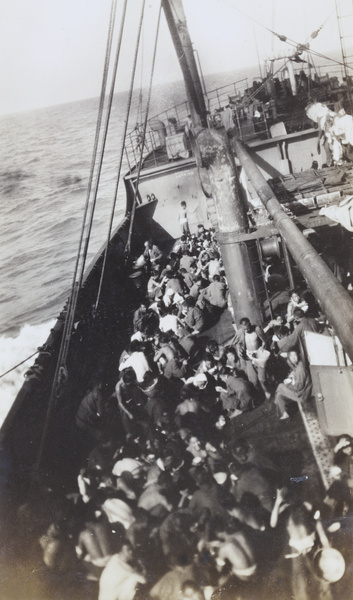 Chinese Labour Corps having a meal, on a ship