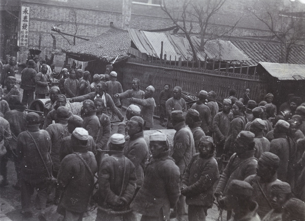 Chain gang convicts at work, road making, Shanghai