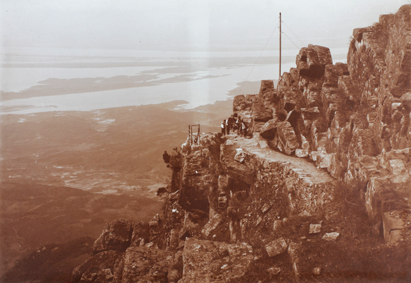 A sedan chair on a mountain path, near Kuling