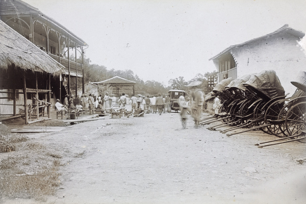 A rest house on the way to Lushan, with chairs and rickshaws