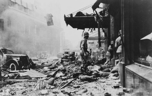 Casualties and debris outside the Cathay Hotel, Shanghai, after the bombing on 14 August 1937