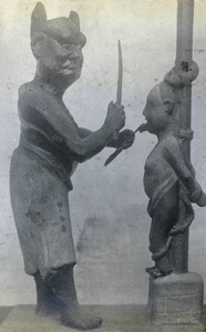 A grotesque clay figurine (torture)