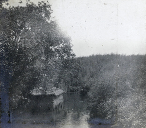 A boathouse in a river