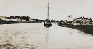 Sailing boat on a river