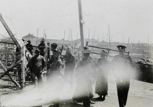 Police manning a barricade on a bridge, Shanghai, March 1927