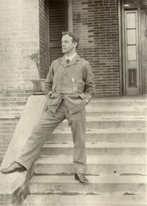 Man on steps wearing a suit