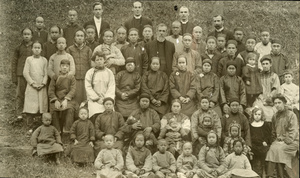 Large Chinese group with Western clergy