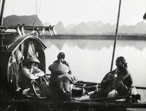 A meal on a riverboat, Guangxi province