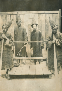 Stocks for punishment beatings of perpetrators of the ‘Kucheng massacre’