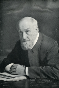 Portrait of a man at a desk