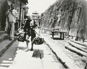 Pedlar with wood, Changsha, Hunan