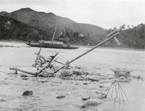 Self-acting rice pounder, in a river