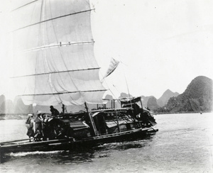 Sampan under sail on Cassia River