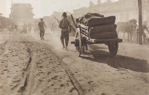 Carters and road traffic, near Yongdingmen, Beijing