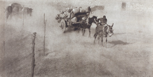 Carters guide goods carts along dusty road, Peking