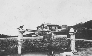 Foreigners posing with a sedan chair, Kuling (牯岭)