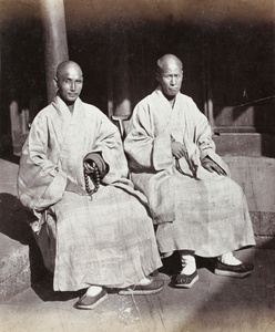 Two Buddhist priests or monks, with prayer beads