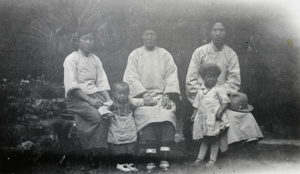 Three women with two children, 1930s