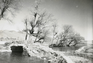 A canal on the Tungchuan plain