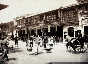 Pedlars and a rickshaw, Nanking Road (Nanjing Dong Lu), Shanghai