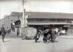 Hauling a load of soap onto Chapoo Road Bridge (Zhapu Lu), across North Soochow Road (Beisuzhou Lu), Shanghai