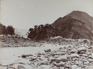 Rope bridge over mountain river