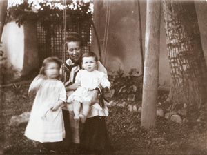 Mrs Elliott with Dare and Charles, on swing