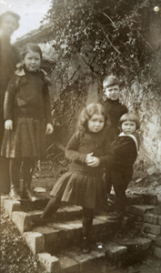 Children in the Elliott's garden at Paoning