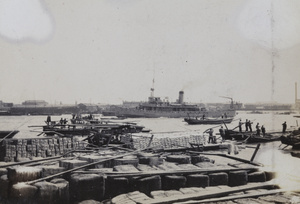 A Chinese sea plane carrier, and barges, Huangpu River, Shanghai