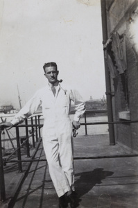 Mr Pulman wearing work overalls, Shanghai