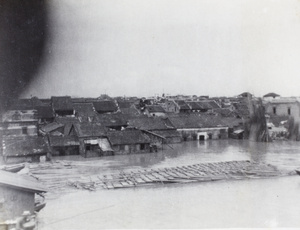 Raft of bamboo culms on flooded Yangzi River, Anqing, 1931