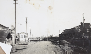 Damaged buildings beside creek, Zhabei, Shanghai, 1932