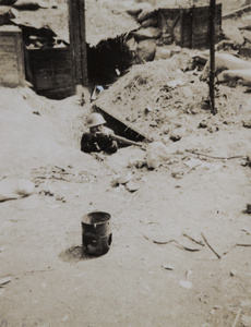 Japanese Marine posed in dugout, Shanghai, 1932