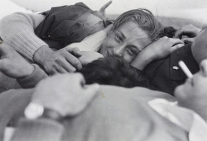 Hikers in a tent beside the Huangpu River, near Shanghai